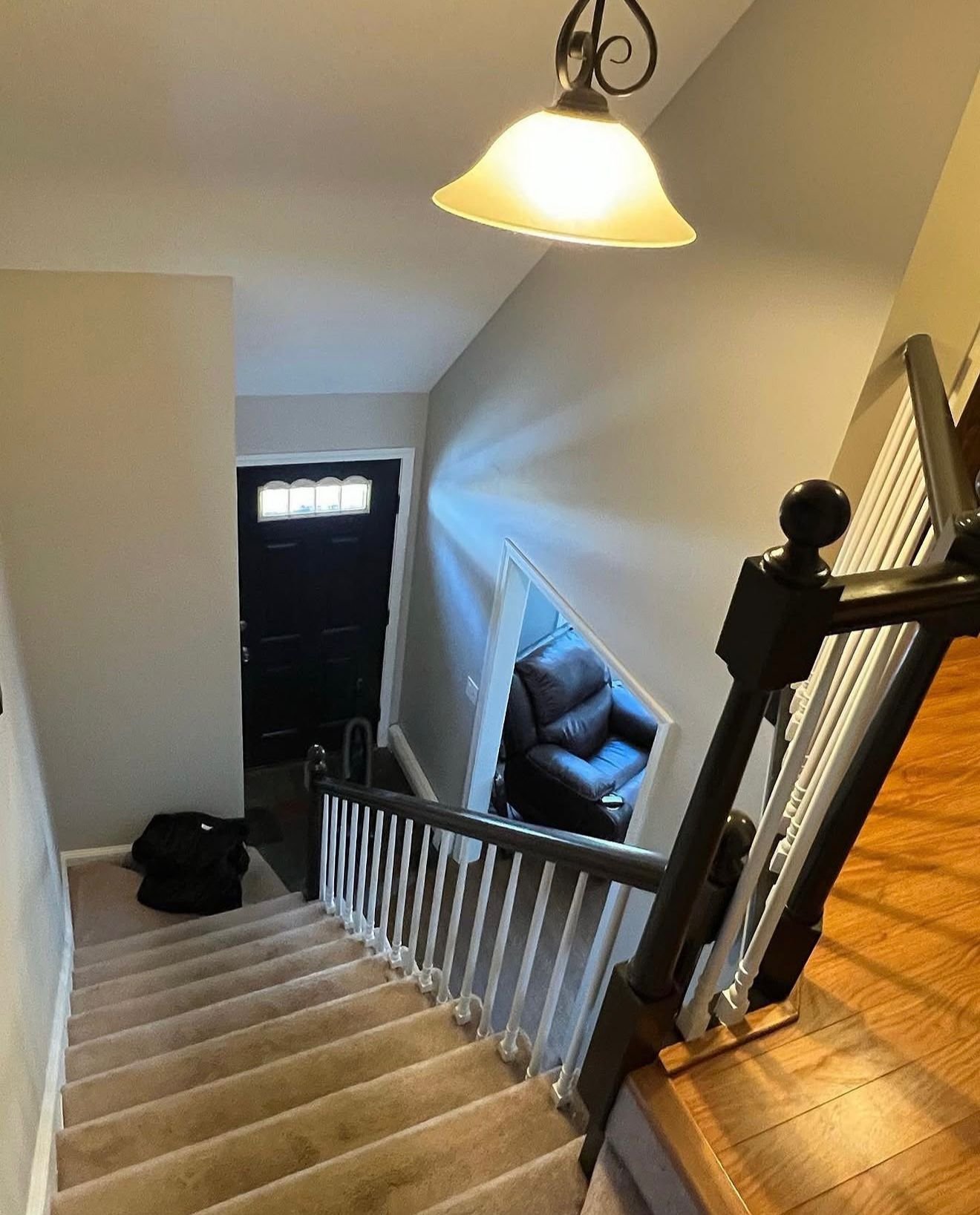 Finished staircase and hallway painting by Daibes Painting